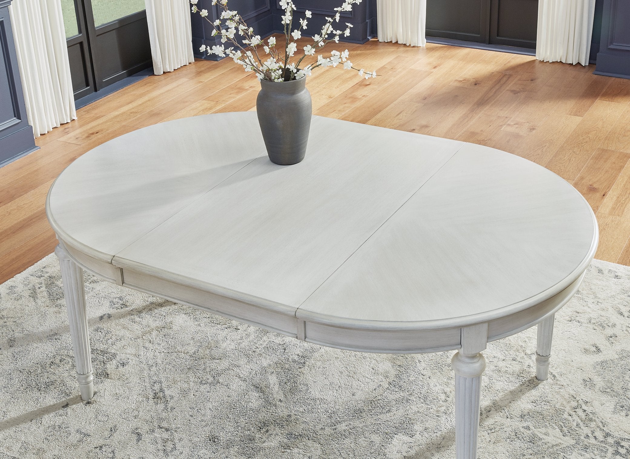 Montelaine Dining Extension Table - Ideal Furniture (Fresno,CA) 