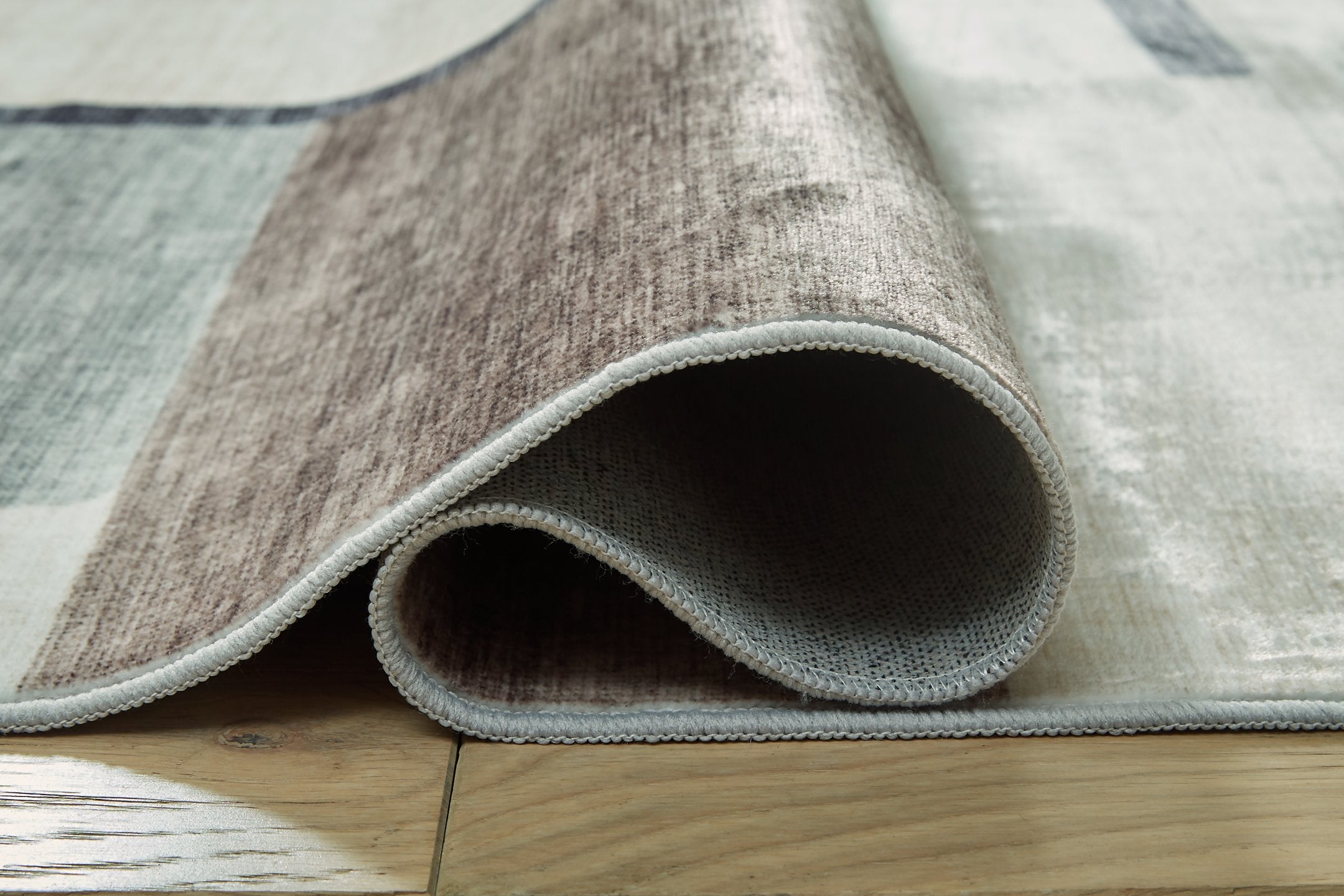 Larkport Washable Area Rug - Ideal Furniture (Fresno,CA) 